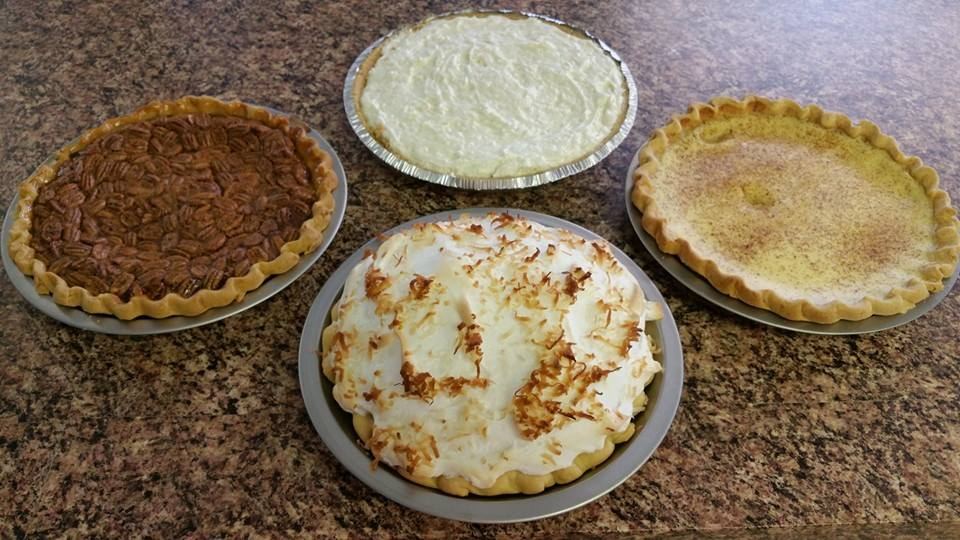 Four homemade pies, including pecan and meringue pies